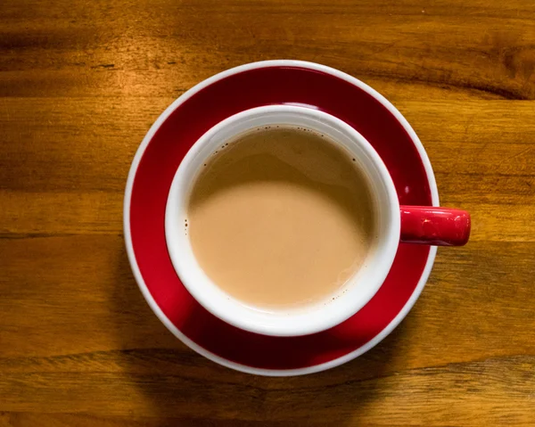 Tazza di caffè e piattino sul tavolo — Foto Stock