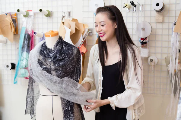 Asian American Fashion Designer Dressing Mannequin — Stock Photo, Image