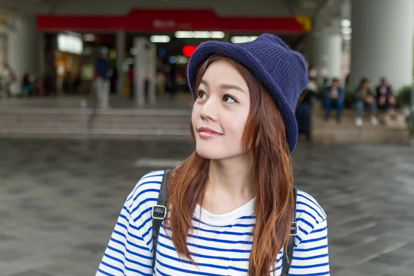 Asian woman outside subway station — Stock Photo, Image