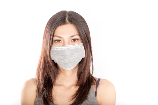 Asian woman wearing a surgical mask — Stock Photo, Image