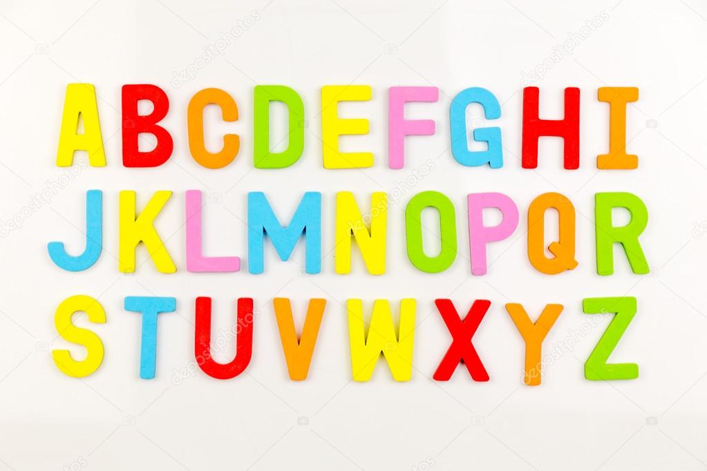 Alphabet magnets on whiteboard