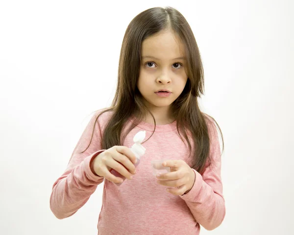 Young girl taking medicine — Stock Photo, Image