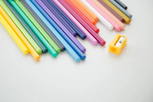 Row of color pencil crayons — Stock Photo, Image