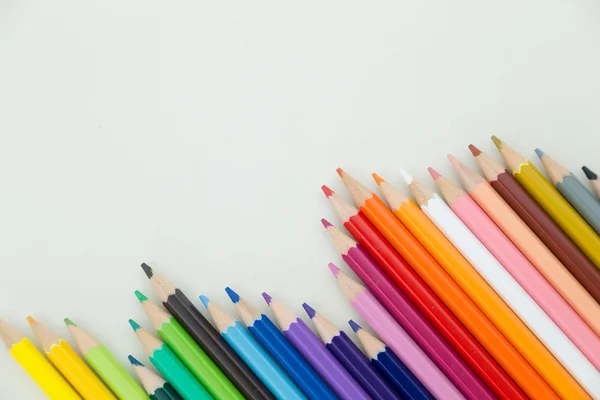 Row of color pencil crayons — Stock Photo, Image