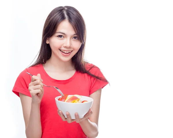 Chinese woman holding bowl of fruit — Stock Photo, Image