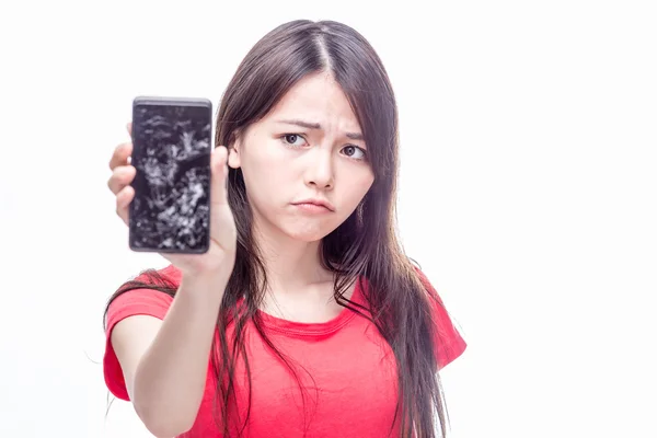 Kinesisk kvinna med knäckt mobiltelefon — Stockfoto