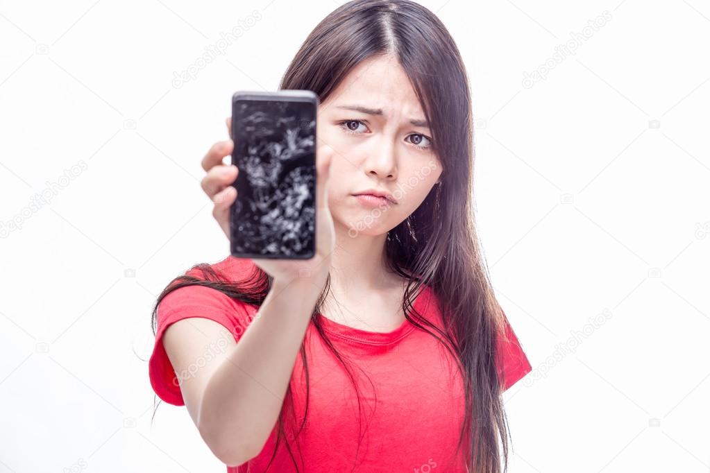 Chinese woman with cracked cell phone