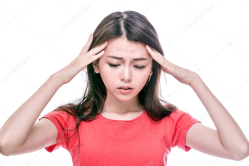 Asian woman with headache