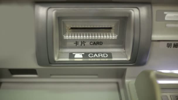 ATM card ejecting from machine — Stock Video