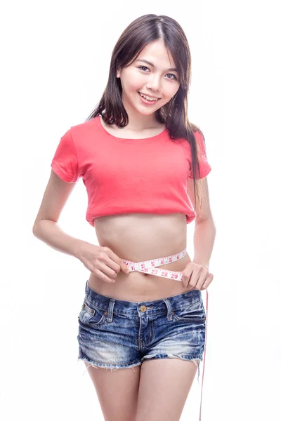 Chinese woman measuring waist — Stock Photo, Image