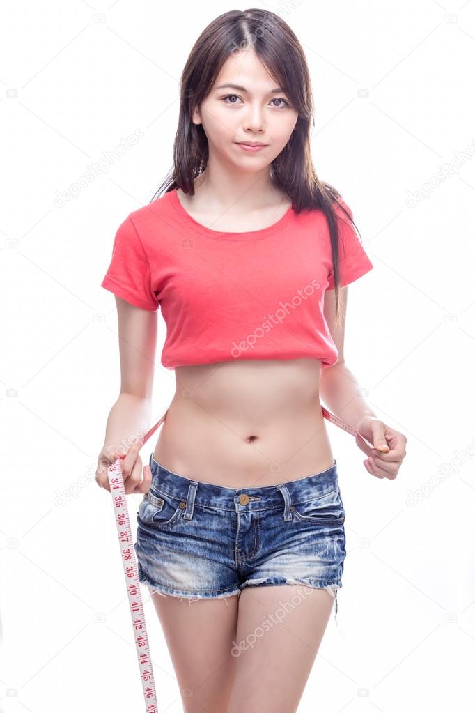 Chinese woman measuring waist