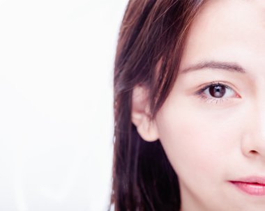 Asyalı kadının yüzüne yarısı