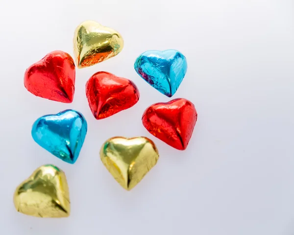 Čokoládové srdce v alobalu — Stock fotografie