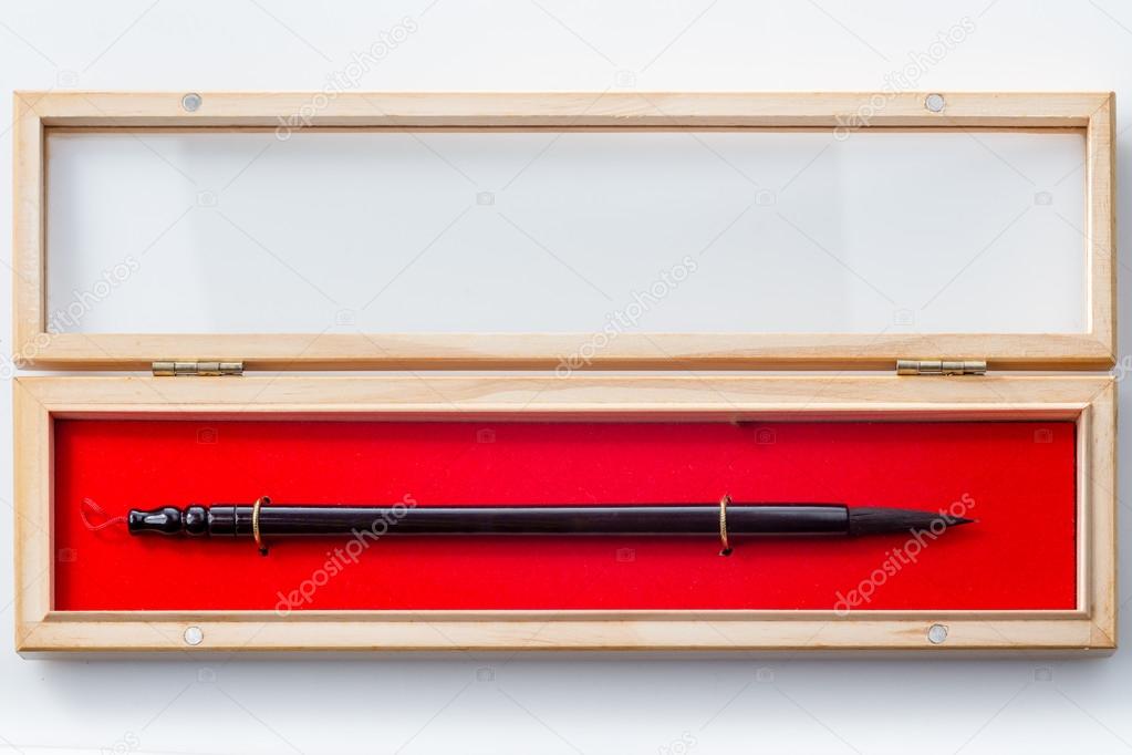 Chinese calligraphy brush in box on white