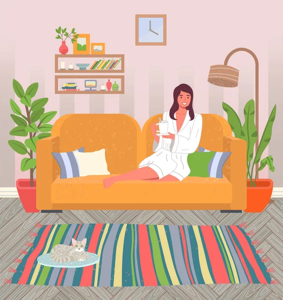 Девушка дома на диване, в халате и с кружкой чая. Кот на коврике. Уютный дом — стоковый вектор