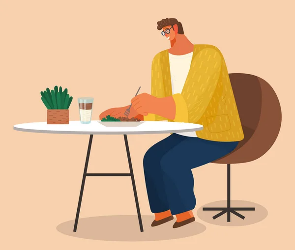 Homem elegante jovem em óculos sentado em poltrona macia em casa ou restaurante em uma mesa comendo salada — Vetor de Stock