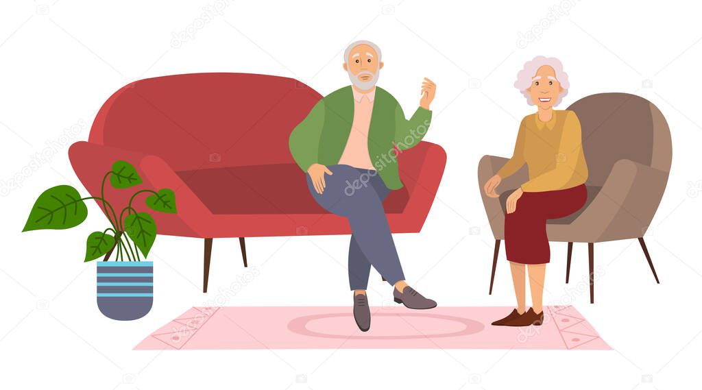 Elderly couple sitting on the sofa at home. Retired elderly couple in love. Grandparents family