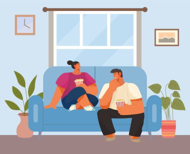 Bir çift kadın ve bir erkek kanepede oturuyor, film izliyor ve patlamış mısır yiyor, birlikte dinleniyorlar.