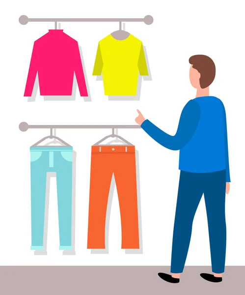 Man is looking on shirts and pants. Male buyer and hangers with fashionable men s clothing — Stock Vector