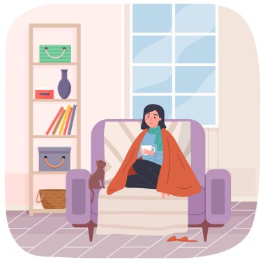 Evde kendini izole eden hasta bir kız ilaç alıyor. Grip olmuş kedi sıcak çay içiyor.