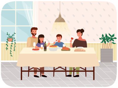 Aile üyeleri İtalyan makarnası ve biftek yiyorlar. Sıcak mutfak odasında birlikte oturuyorlar.