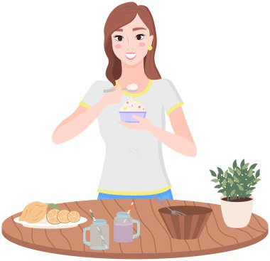 Doğal yoğurt yiyen bir kız. Sağlıklı vejetaryen yemeği hazırlayan ya da meyve suyu içen kadın.