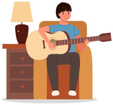 Evde gitar çalan genç bir adam. Koltuğunda oturan adam müzik aleti ile müzik yapıyor.