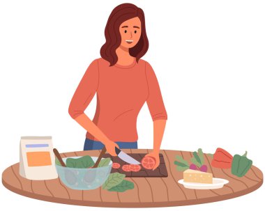 Kadın mutfakta vejetaryen malzemeler kullanarak salata hazırlıyor. Kız sağlıklı yemek için sebze kesiyor.