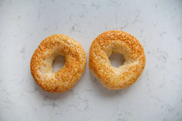 Two Bagels Sesame Seeds Marble Kitchen Worktop Counter Top View — Stockfoto