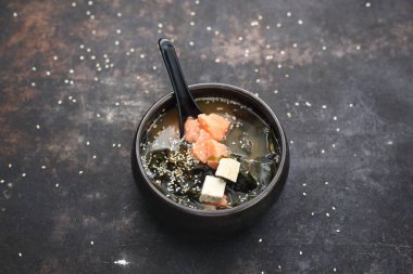 Top view of a misoshiru. A traditional Japanese soup with salmon. 