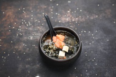 A traditional Japanese soup with salmon. The misoshiru. 