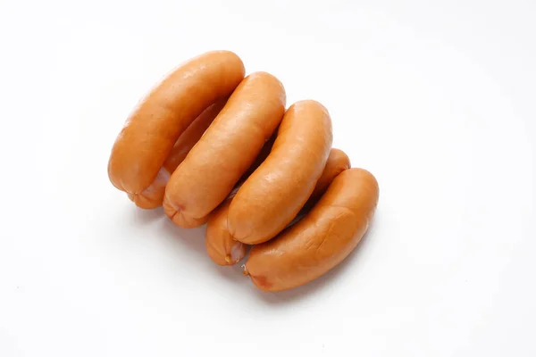 Serdelki, wiener sausages in rings, a packshot photo for package design, template. Polish serdelki, frankfurter, isolated on a white background. Traditional meat product. — Foto Stock
