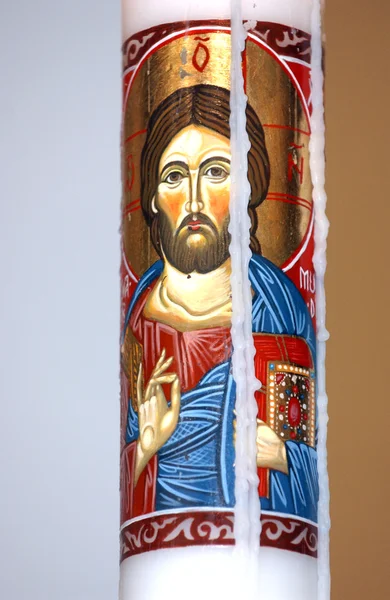 Candle with an image of Christ — Stock Photo, Image