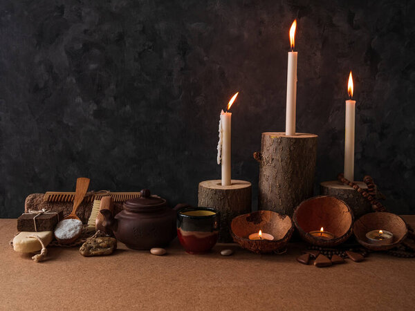 Spa wellness zero waste concept, natural wooden candle holders, coconut shells, peeling sand stone coffee salt scrub, eco friendly wood haircomb. Clean exfoliation product relaxation massage gift card