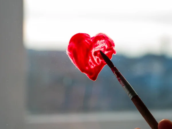 Little Girl Holds Paintbrush Hand Drawing Red Heart Window Glass — Stock Photo, Image