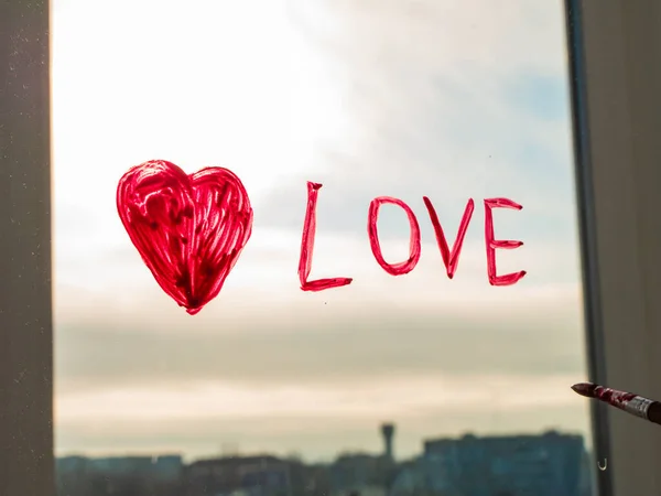 Little Girl Holds Paintbrush Hand Drawing Red Heart Window Glass — Stock Photo, Image