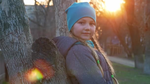 Happy Girl Long Braided Hair Portrait Spring Park Sits Tree — Stock Video