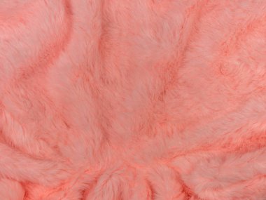 Pembe kürk desenli üst görünüm. Mercan kabarık kumaş kaplama arka plan. Kış moda trendleri kadınsı düz yatış, kadın blog arkaplanı metin işareti için arzulanıyor. Kız soyut duvar kağıdı tekstil yüzeyi