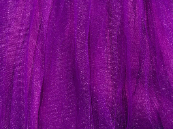 紫色郁金香织物纹理顶部视图 紫罗兰背景 时尚流行色彩女性短裙连衣裙平铺 女性博客光滑背景字体设计 女用抽象墙纸 织物表面 — 图库照片