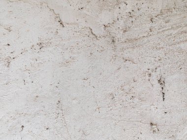 Alçı lambalı gri beton, duvar boyalı tek renkli arka plan. Siyah ve beyaz taş ev kireçtaşı çit dokusu. Metin imzası tasarımı için boşluk kopyala. Mimari detay grunge desenli arkaplan