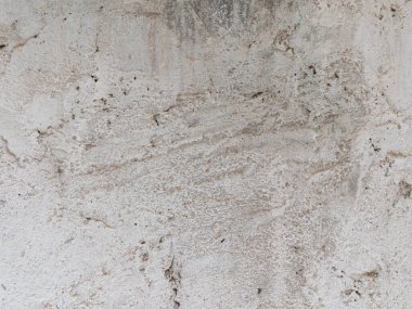 Alçı lambalı gri beton, duvar boyalı tek renkli arka plan. Siyah ve beyaz taş ev kireçtaşı çit dokusu. Metin imzası tasarımı için boşluk kopyala. Mimari detay grunge desenli arkaplan