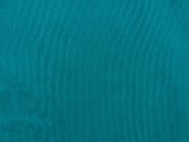 Turkuaz forma kumaş kumaş desen üst görünümü. Mavi örgü elbise arka planı. Moda rengi moda kıyafetler. Web sitesi metin tablosu tasarımı. Soyut su deniz duvar kağıdı yeşil tekstil yüzeyi.