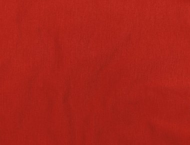 Kırmızı forma kumaş, mat desen üst görünüm. Eskici örgü arka planı. Moda rengi moda kıyafetler. Web sitesi metin tablosu tasarımı. Soyut bordo duvar kağıdı lüks tekstil yüzeyi.