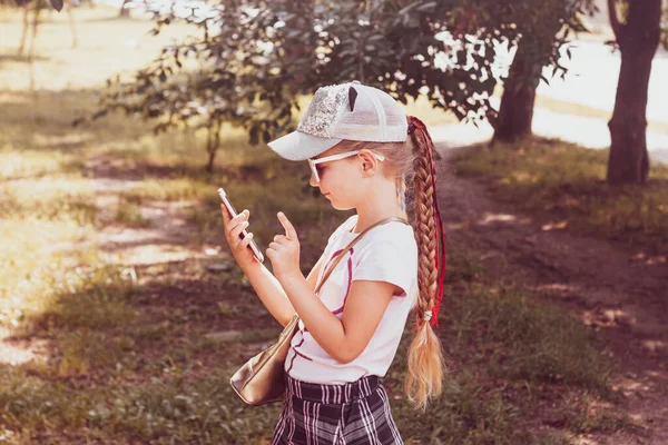 Adorable Little Girl Long Braided Hair Baseball Cap Smartphone Outdoor — Stock Photo, Image