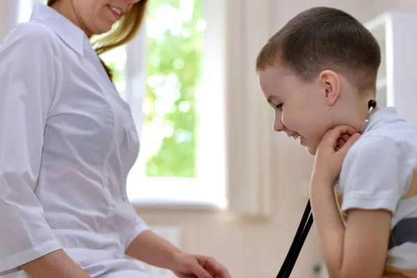 Child Laughs Stethoscope Headphones His Ears Doctor Girl White Clothes — Stock Photo, Image