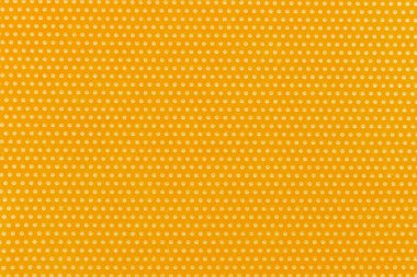 Tekstil arka planı, beyaz benekli sarı.. 