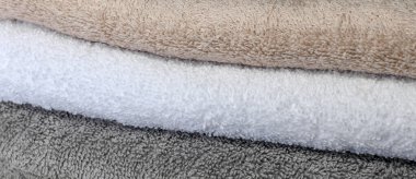 Havlulardan yapılmış çapraz bir arkaplan.