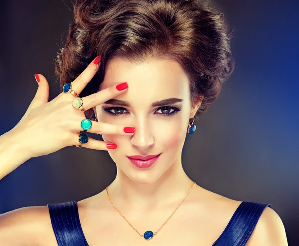 Fashion woman with rings on fingers — Stock Photo, Image