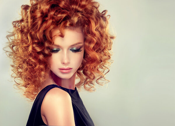 redhead woman  with  curly hair