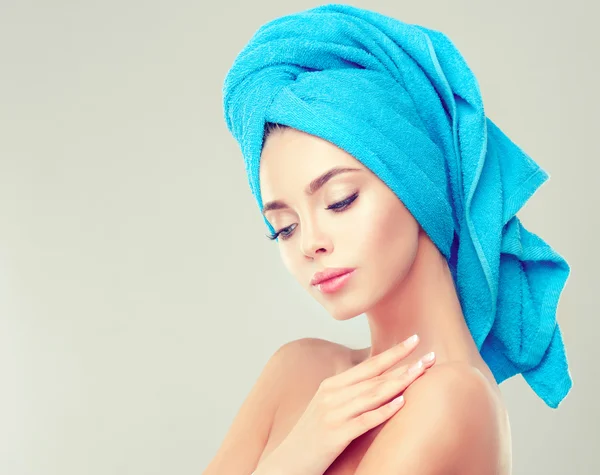 Girl with a towel on her head — Stock Photo, Image